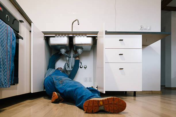 Professional Drain Cleaning technician working in Cambridge, MD
